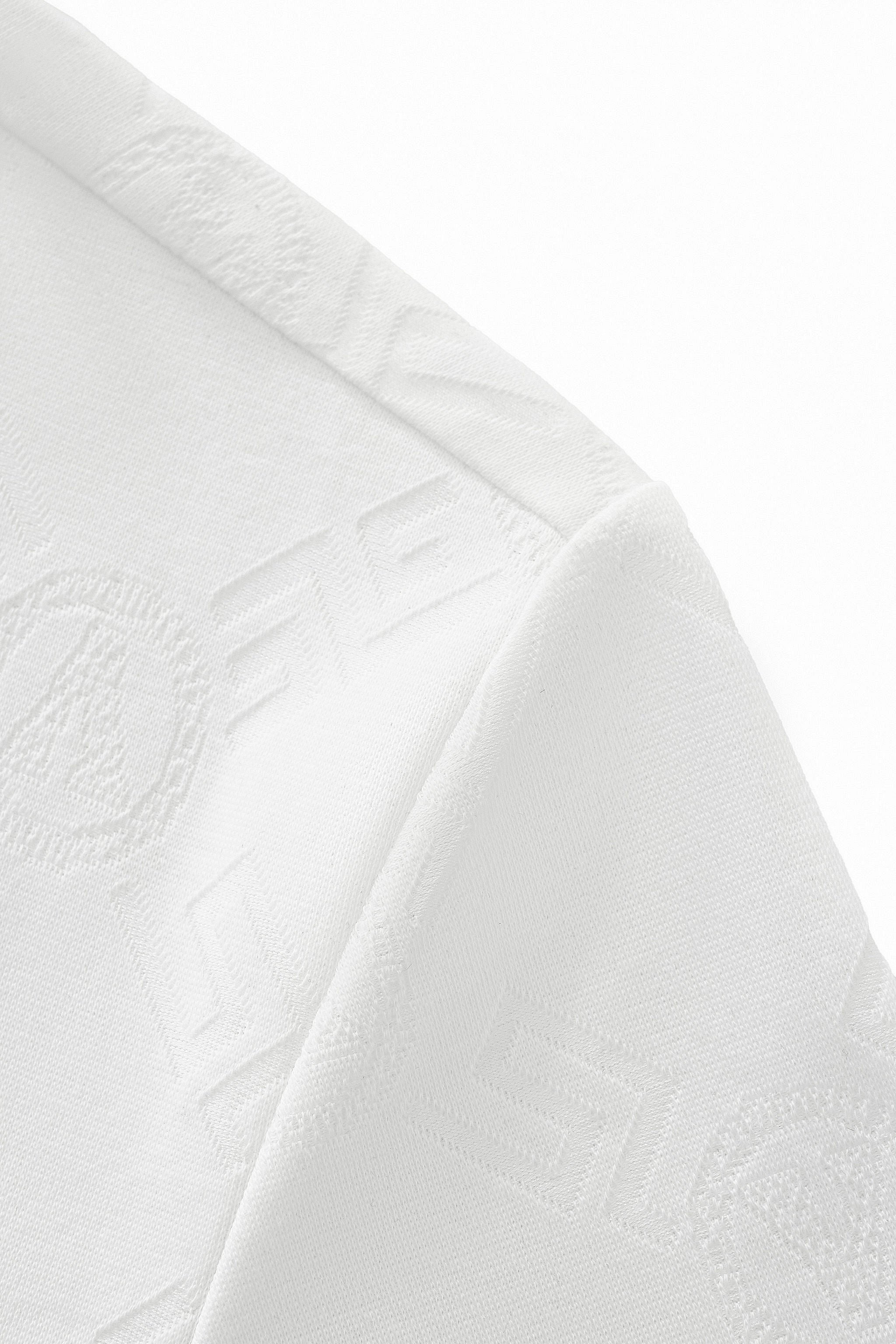 Embossed Monogram Tee – El Baron WHITE