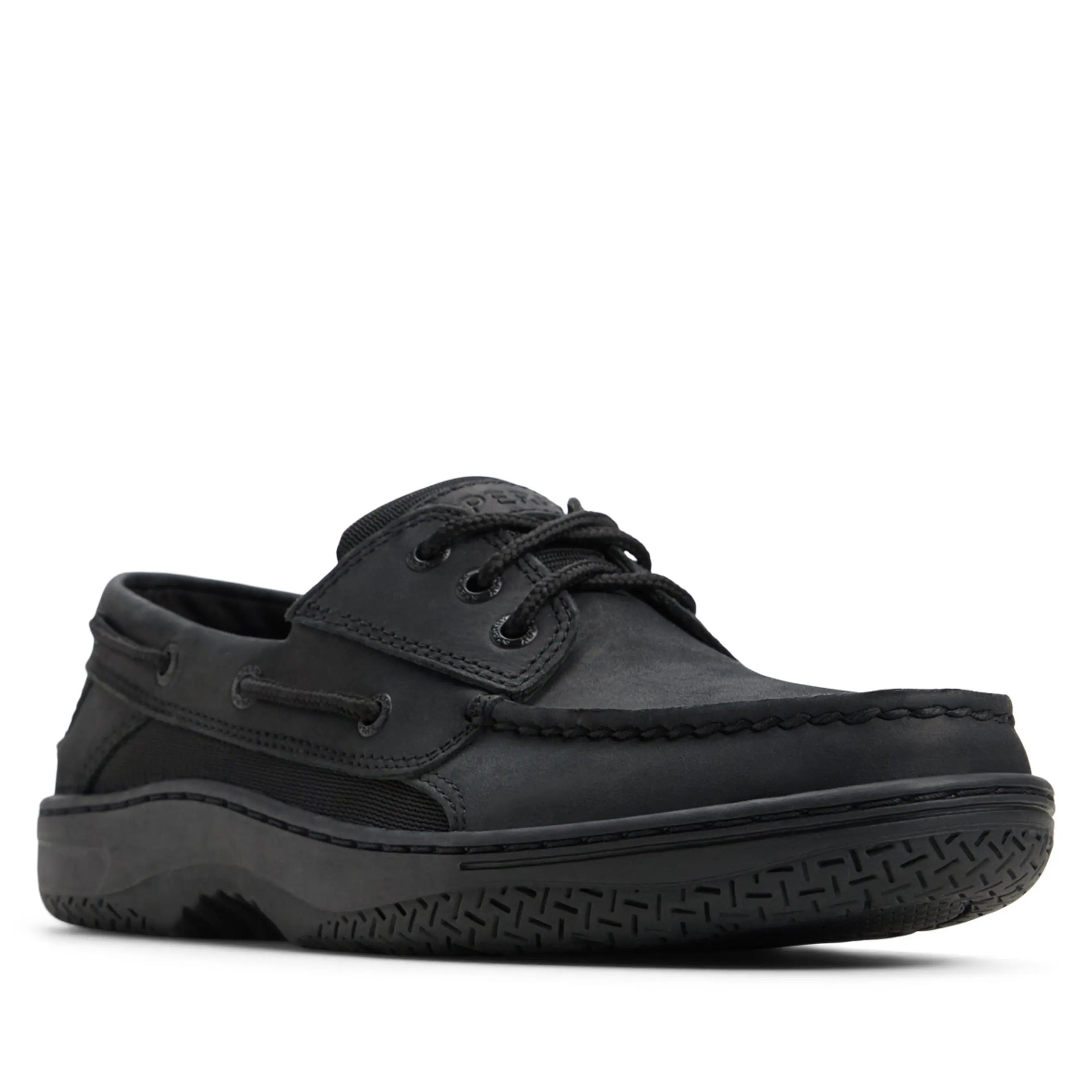 A Sperry sneaker in black textured leather with a translucent purple and gray Swoosh and toe cap, shown in profile against a white background.