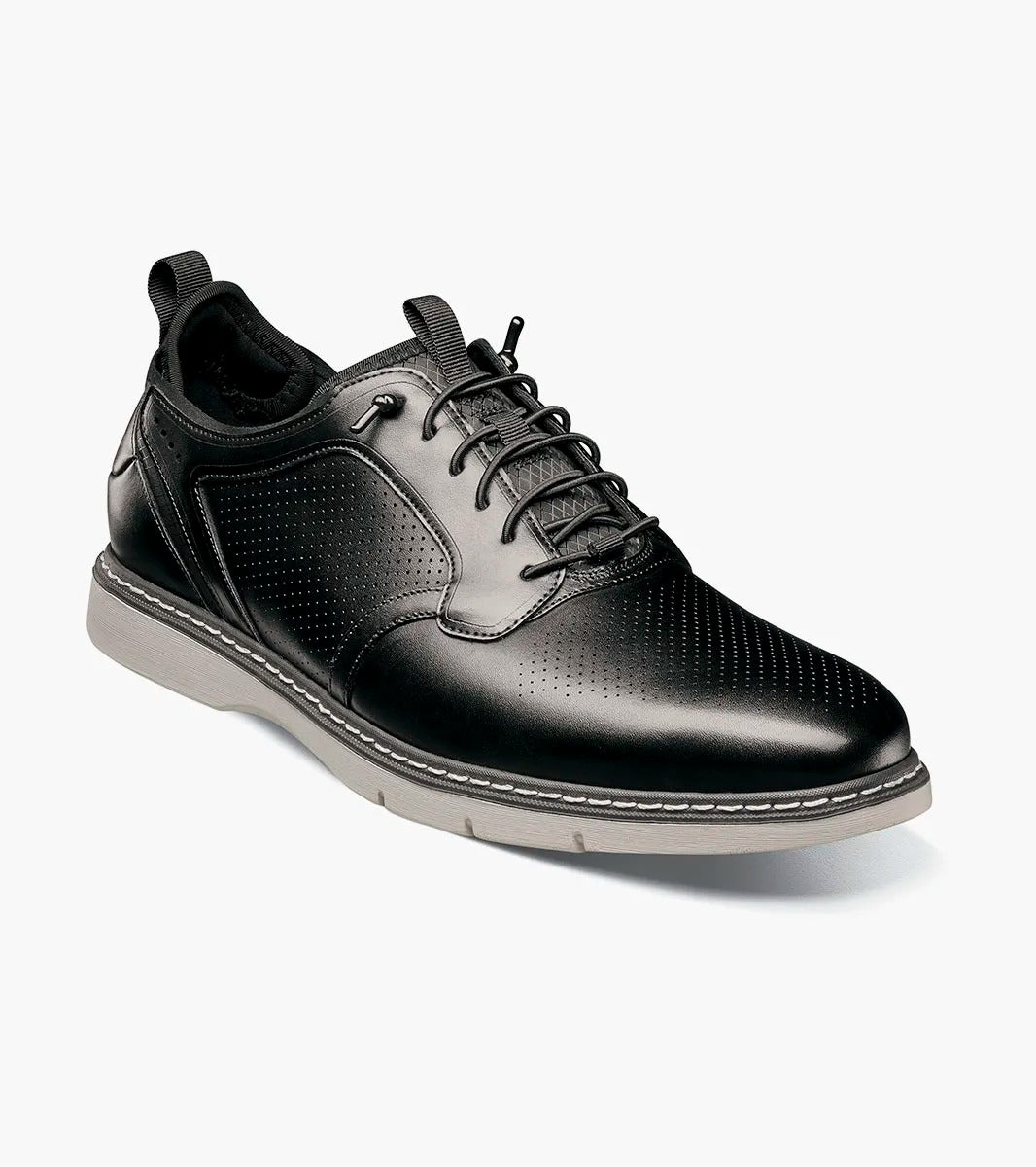 Black leather shoe on a white background